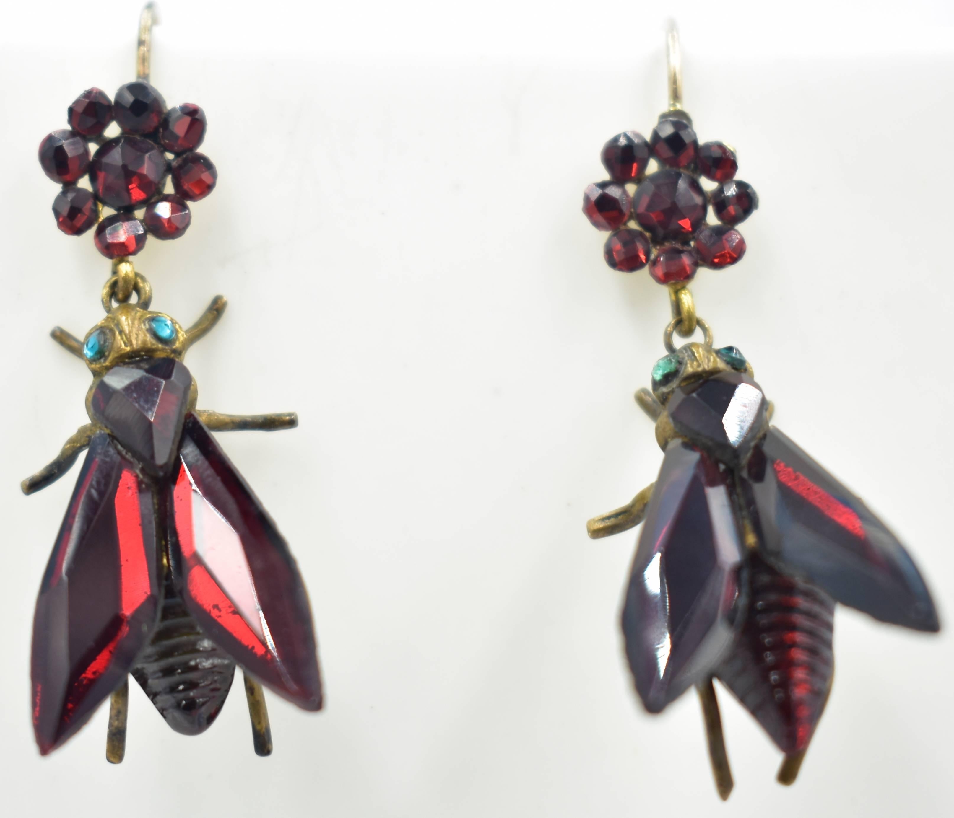 Startling Victorian red Vauxhall glass fly earrings. Vauxhall glass is a mirrored glass that was made into jewelry from the 1770's to the late Victorian age. These sparking earrings measure 3/4
