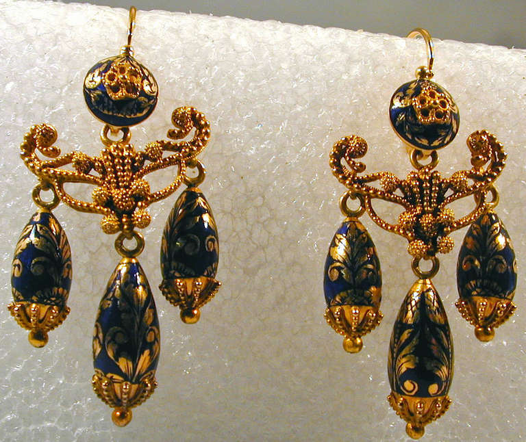 Elegant Georgian girandole earrings in 15K gold and cobalt enamel. The gold work is an elaborate Etruscan design decorated with tiny balls. The earrings measure  1 3/4