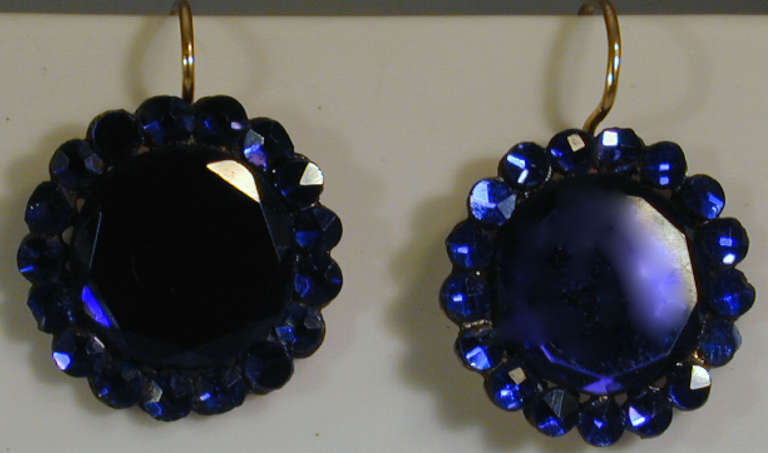 Sparkling Victorian deep blue Vauxhall glass drop earrings. Made at the Vauxhall Glassworks of mirrored glass this jewelry is highly reflective and will sparkle in sun and candlelight. The earrings measure 3/4
