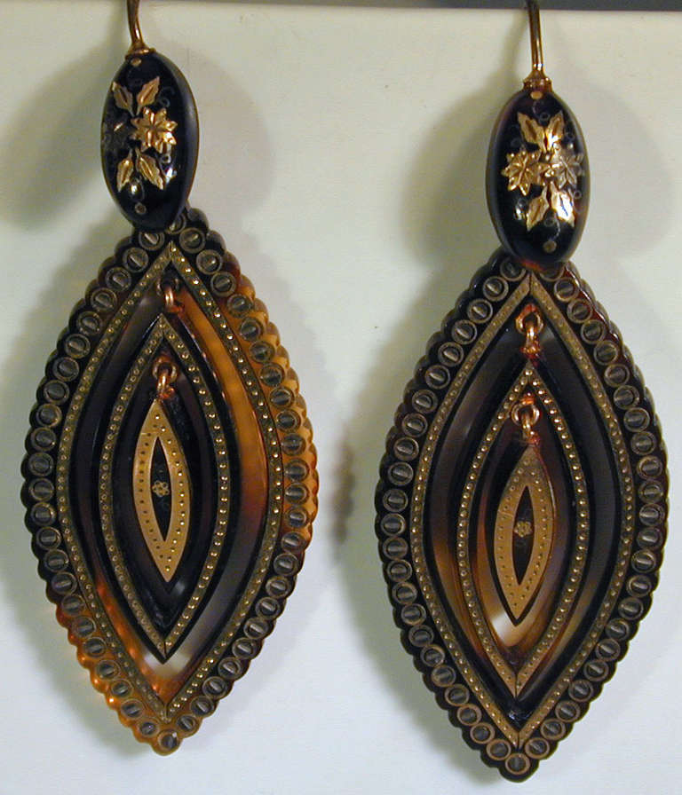 Dramatic Victorian triple hoop pique earrings inlaid with gold and silver. The tops  have a floral motif while the hoops are geometric. Pique work, tortoiseshell inlaid with gold and silver, was brought to England by the Huguenots who fled religious