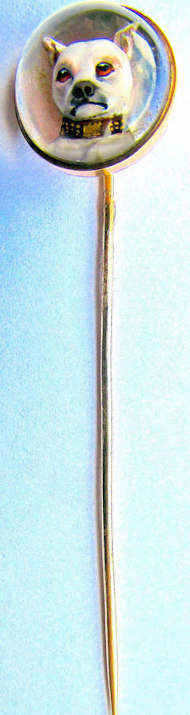 Charming Victorian 18K gold Essex crystal stickpin of an English terrier. Essex crystal is a process where rock crystals are cut as a cabochon (flat on one side and rounded, like a dome, on the other side)  and carved into the flat side of the piece