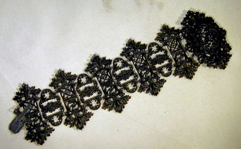 Elegant and elaborate Berlin Iron bracelet.  Iron jewelry was popular during the Napoleonic War when German women donated their precious jewels for the war effort and were given iron jewelry in return.  Some of the iron pieces had the phrase 