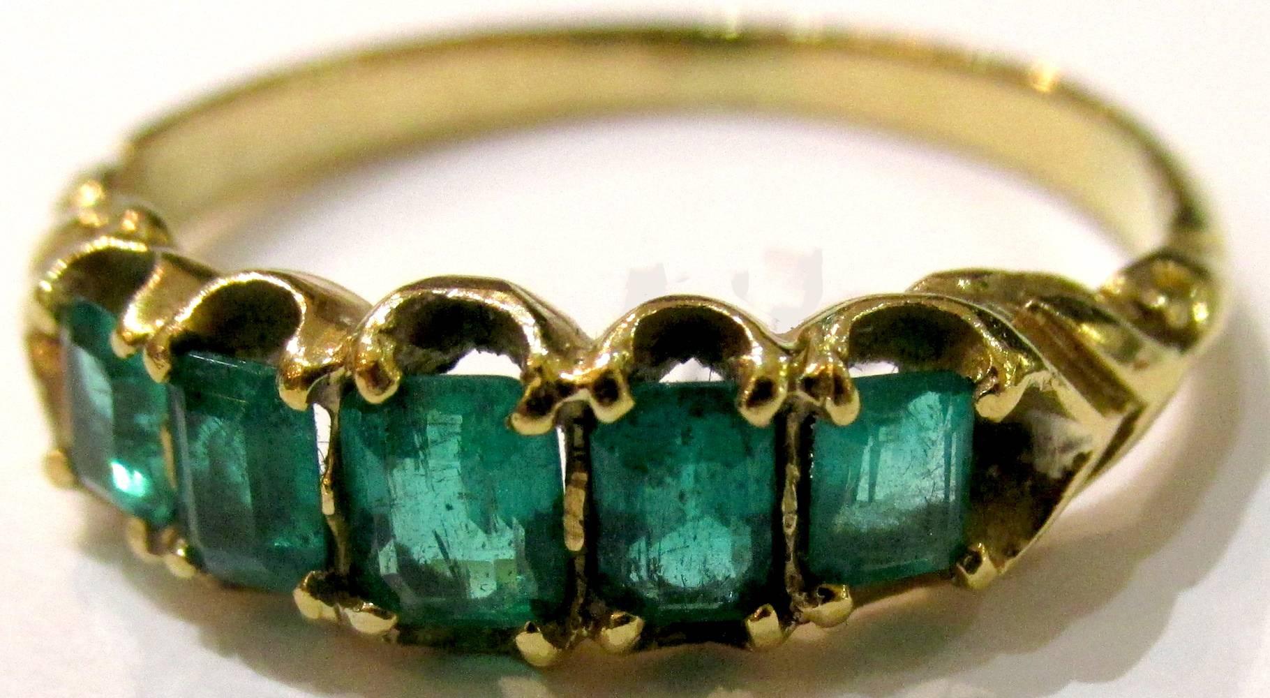 Lovely Victorian five stone emerald ring set in 18K yellow gold can be worn alone or stacked with other rings. The ring is a size 6 1/2.