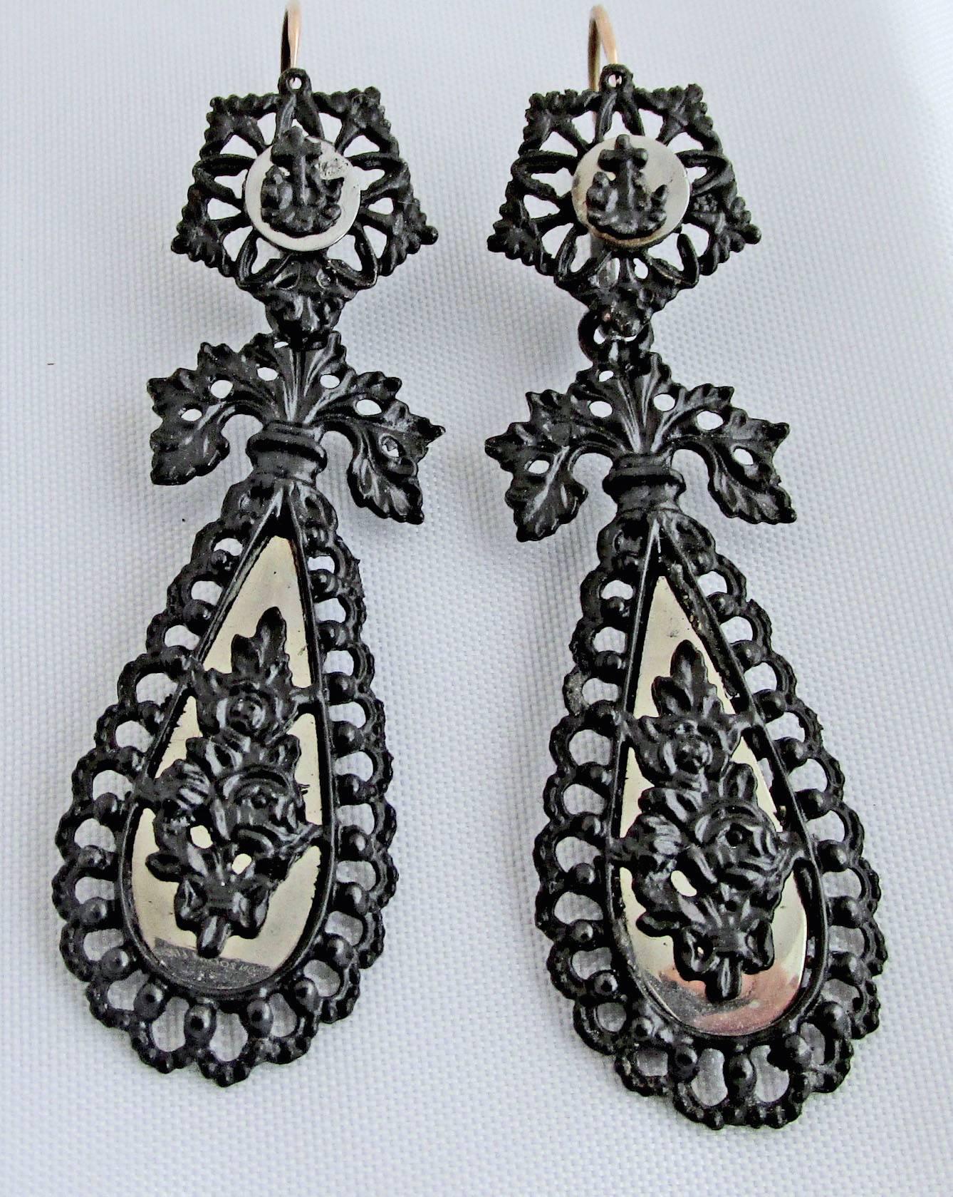 Stunning early 19th Century Berlin Iron earrings with a floral motif which is highlighted with polished steel. Berlin Iron was sought after by Napoleon who invaded German and captured the factory, confiscated the molds and took them back to France