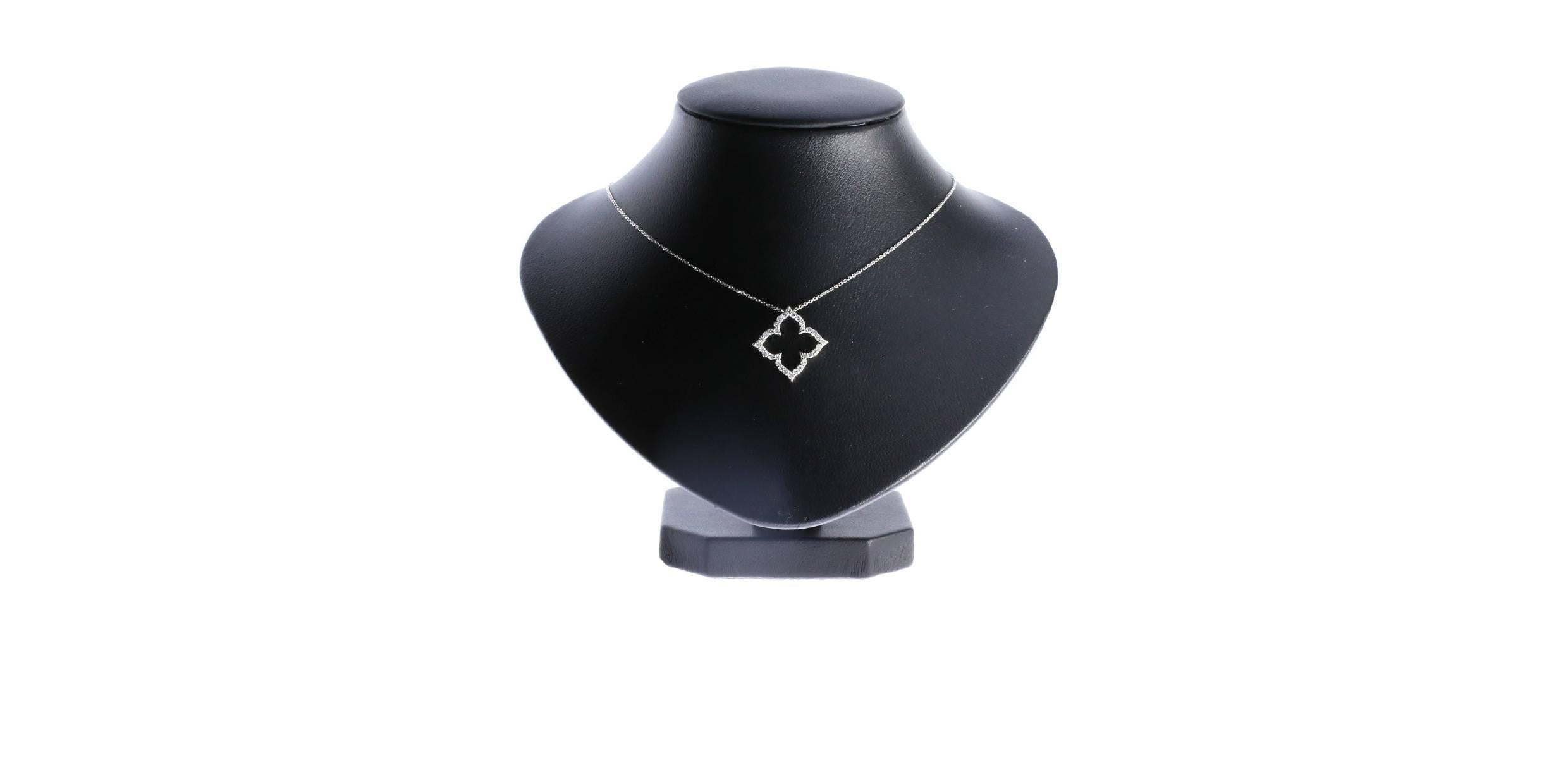 This fashion forward pendant features round brilliant cut diamonds weighing 0.32CTW. The diamonds are GH/SI2 in quality. The diamonds are prong set in a floral or clover cut out shape. The pendant is suspended from an 18 inch 0.8 millimeter cable