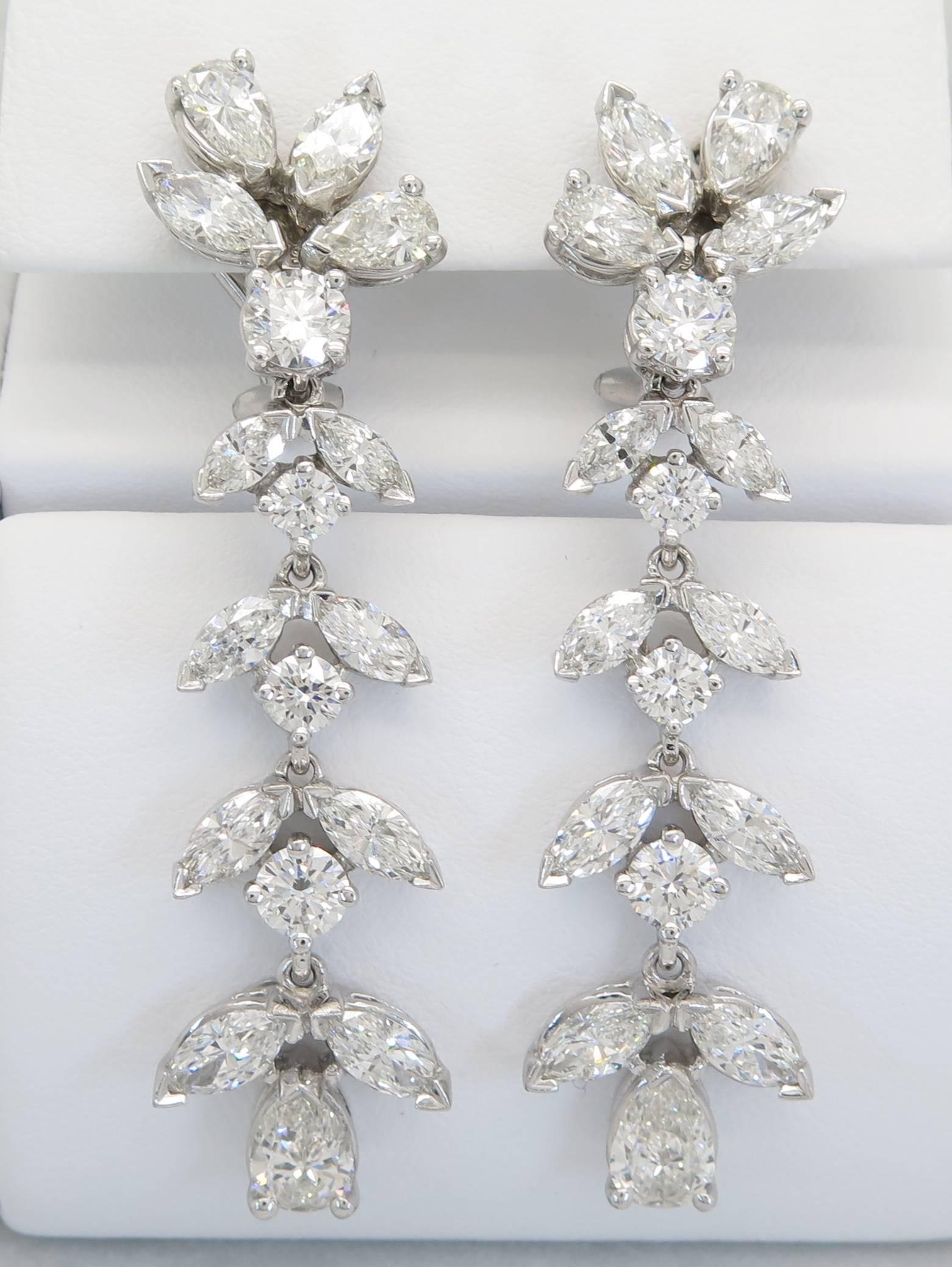 These showstopping earrings are absolutely breathtaking. They are from the prestigious designer Kwiat and feature a total carat weight of 8.75 carats. The earrings feature 6 pear brilliant cut, 20 marquise brilliant cut and 8 round brilliant cut