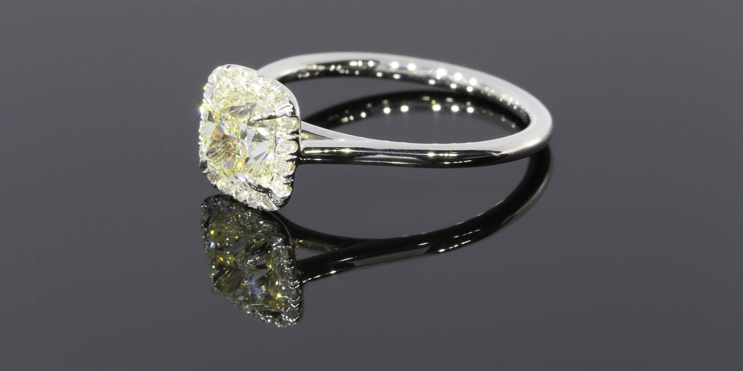 Cushion shaped diamonds are a great mix of the sparkle of a round brilliant and the sophistication of a princess shape, which has made them very popular with brides to be. The center stone in this beautiful engagement ring is a 1.20 carat, cushion