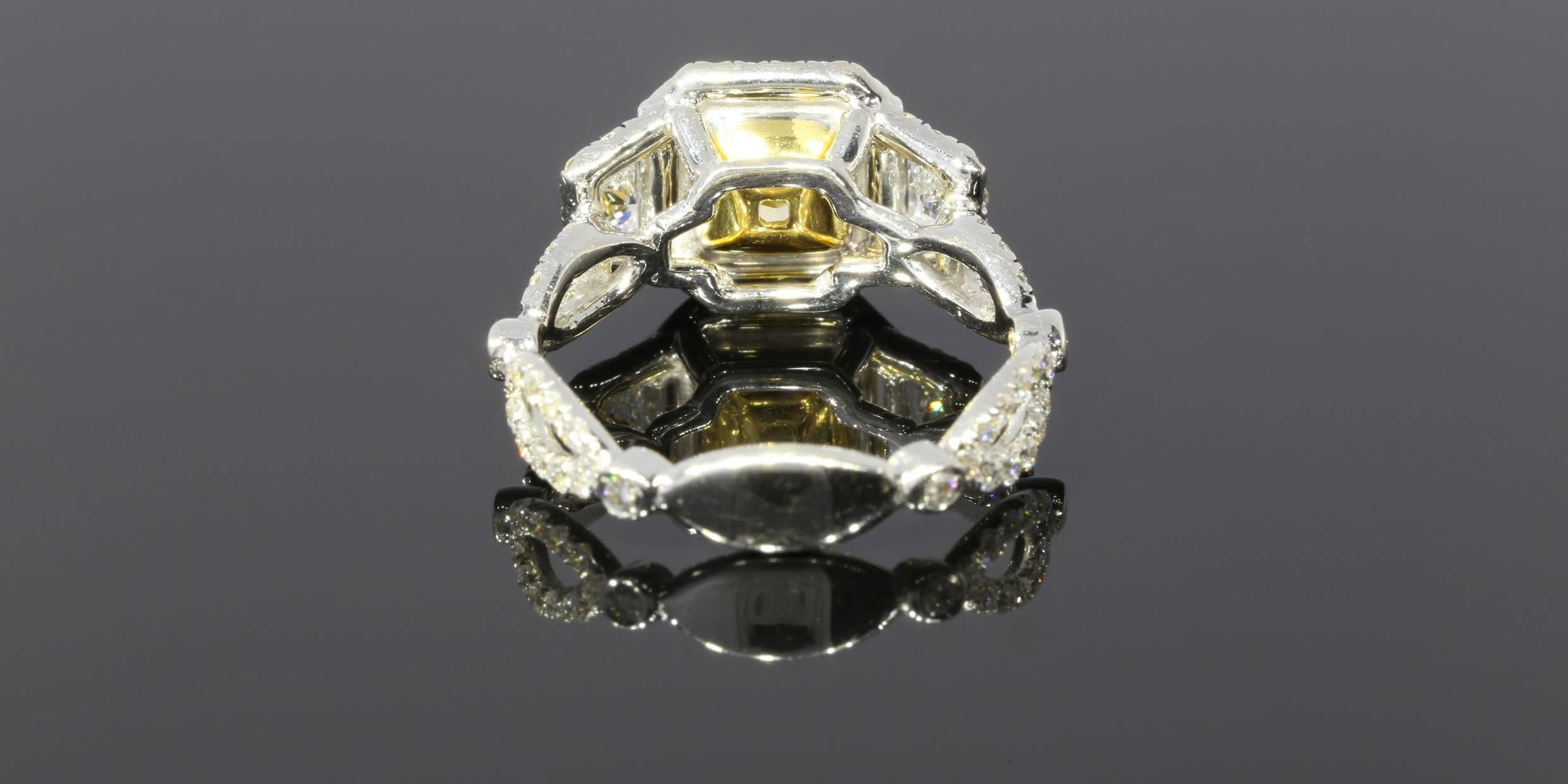 1.57 Carat Radiant Yellow Diamond Halo Two Color Gold Twist Engagement Ring In New Condition In Columbia, MO