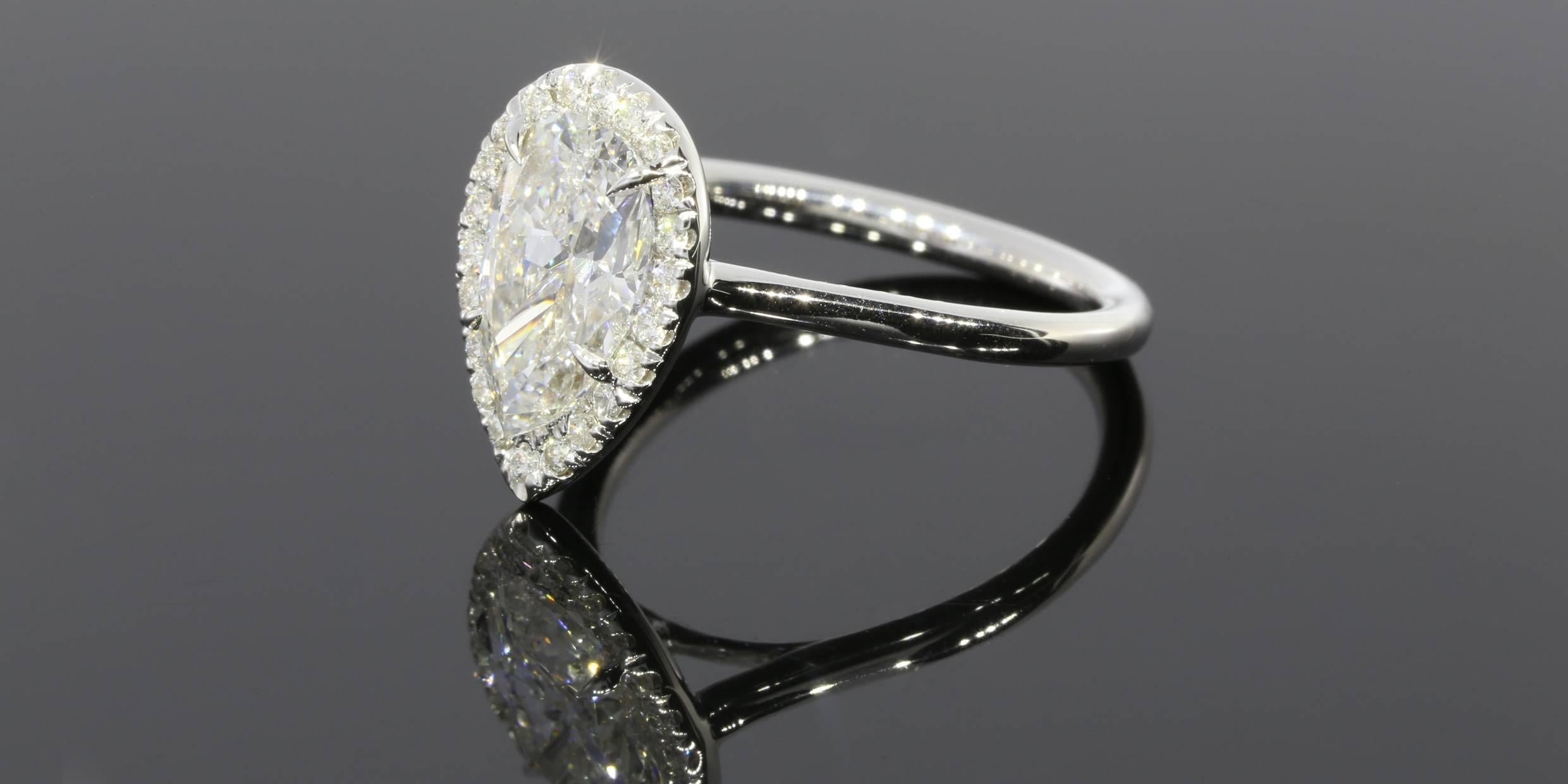 Pear brilliant cut diamonds are a great option if you are looking for something unique that maximizes carat weight. The center diamond in this stunning ring is a 2.11 carat pear brilliant cut that is EGL certified with a color and clarity grade of