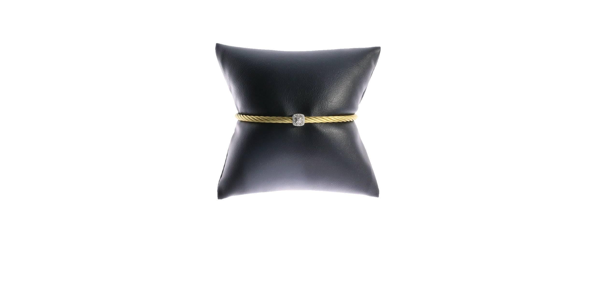 The Swiss designer Charriol is known for two things: watches and cable bracelets. This bracelet is effortlessly chic, edgy, yet feminine. Its single cube shaped, diamond station adds shimmer to its yellow stainless steel cable. The diamonds have a
