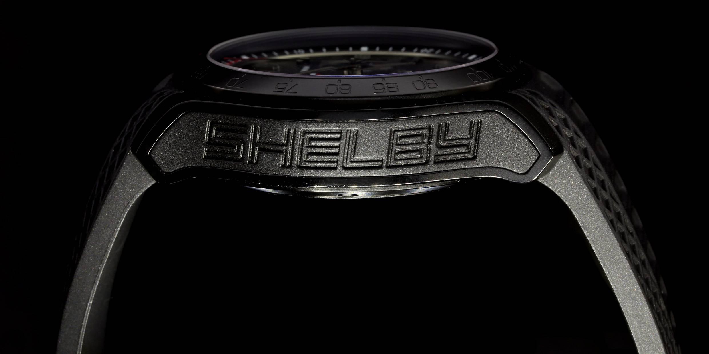 This watch is a brand new, special limited edition watch from David Yurman & Carroll Shelby. The 43 millimeter watch case is comprised of black PVD coated, stainless steel. The Shelby logo is on the left side & the David Yurman logo is on the right