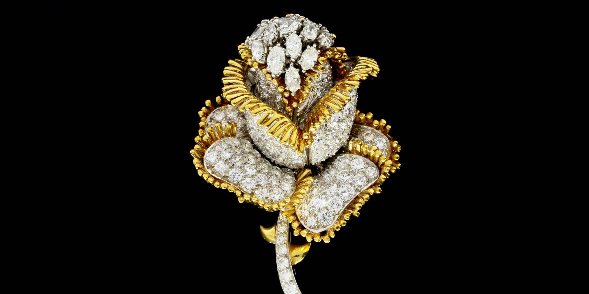 Your look will get a sparkly touch with this beautiful, one of a kind diamond pin/brooch! It features 205 marquise & round brilliant cut diamonds that have a combined total weight of 11 carats! The diamonds are GH/SI in quality. The marquise