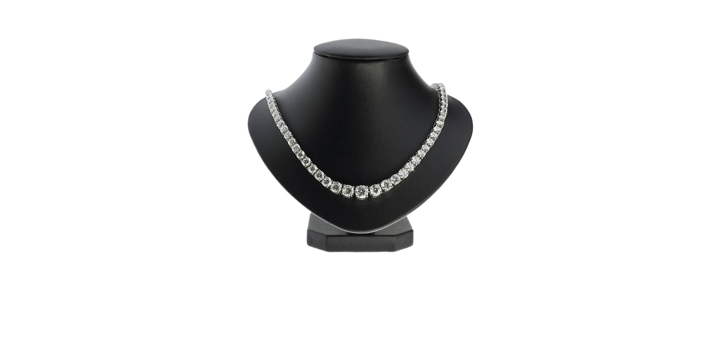 This gorgeous necklace will simply take your breath away! It features a 113 natural round brilliant & marquise cut diamonds that have a combined total weight of 25.32 carats. These sparkling diamonds conservatively grade as GH/VS1-SI1 in quality.