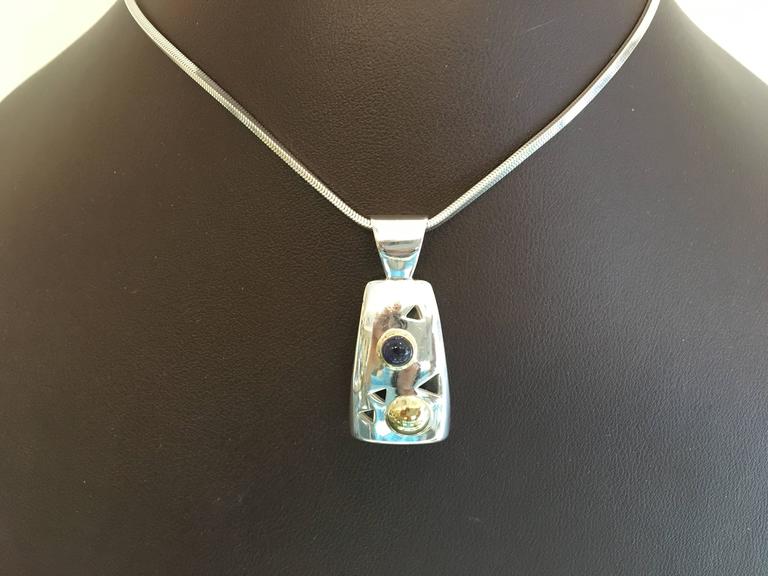John Atencio Gold Toned Blue Topaz Pendant main image 0