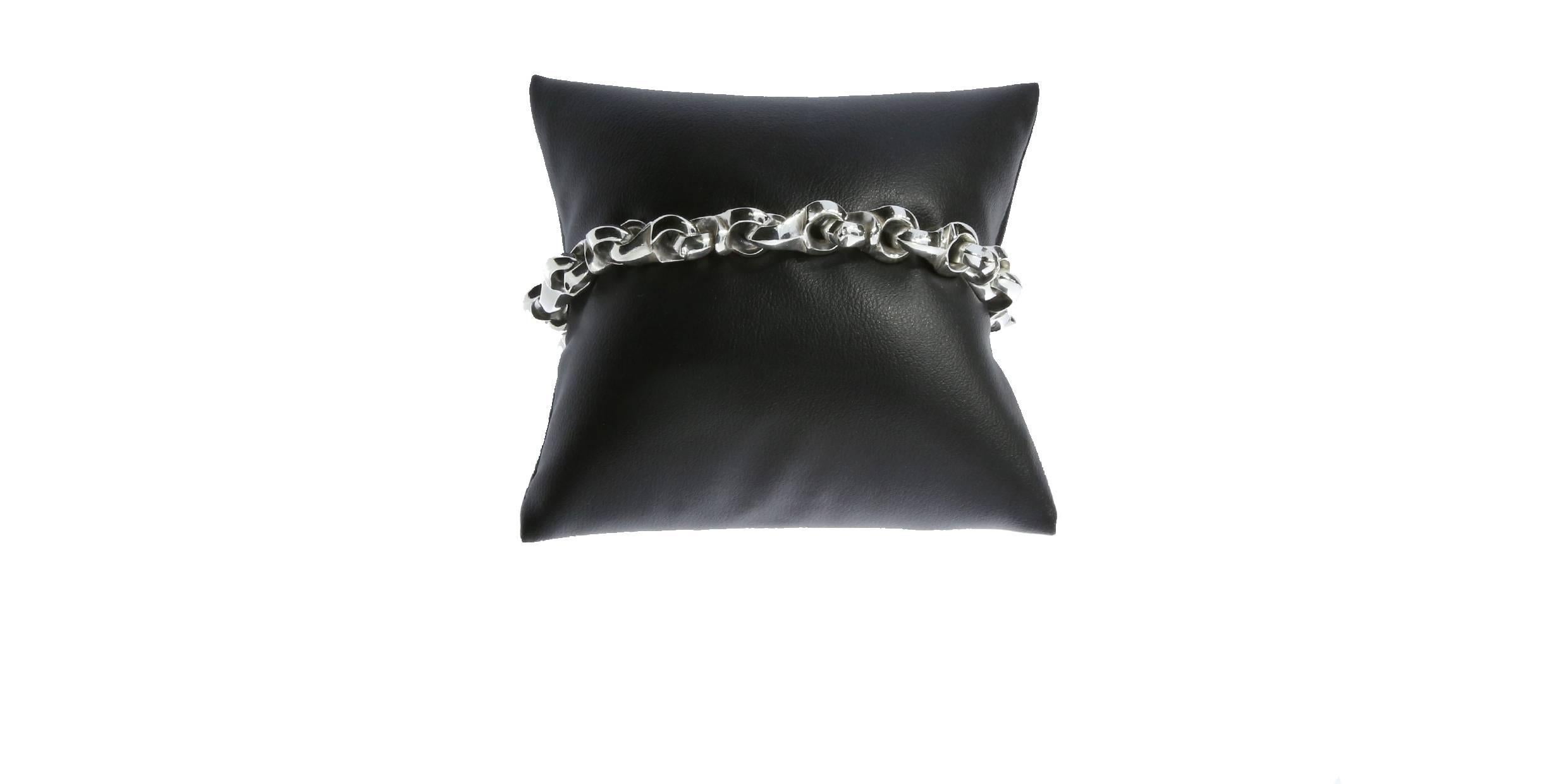 Stephen Webster has gained international acclaim for his exquisite & cutting edge designs. His designs are thought provoking & unpredictable while always celebrating traditional craftsmanship. This super cool, sterling silver bracelet is from the