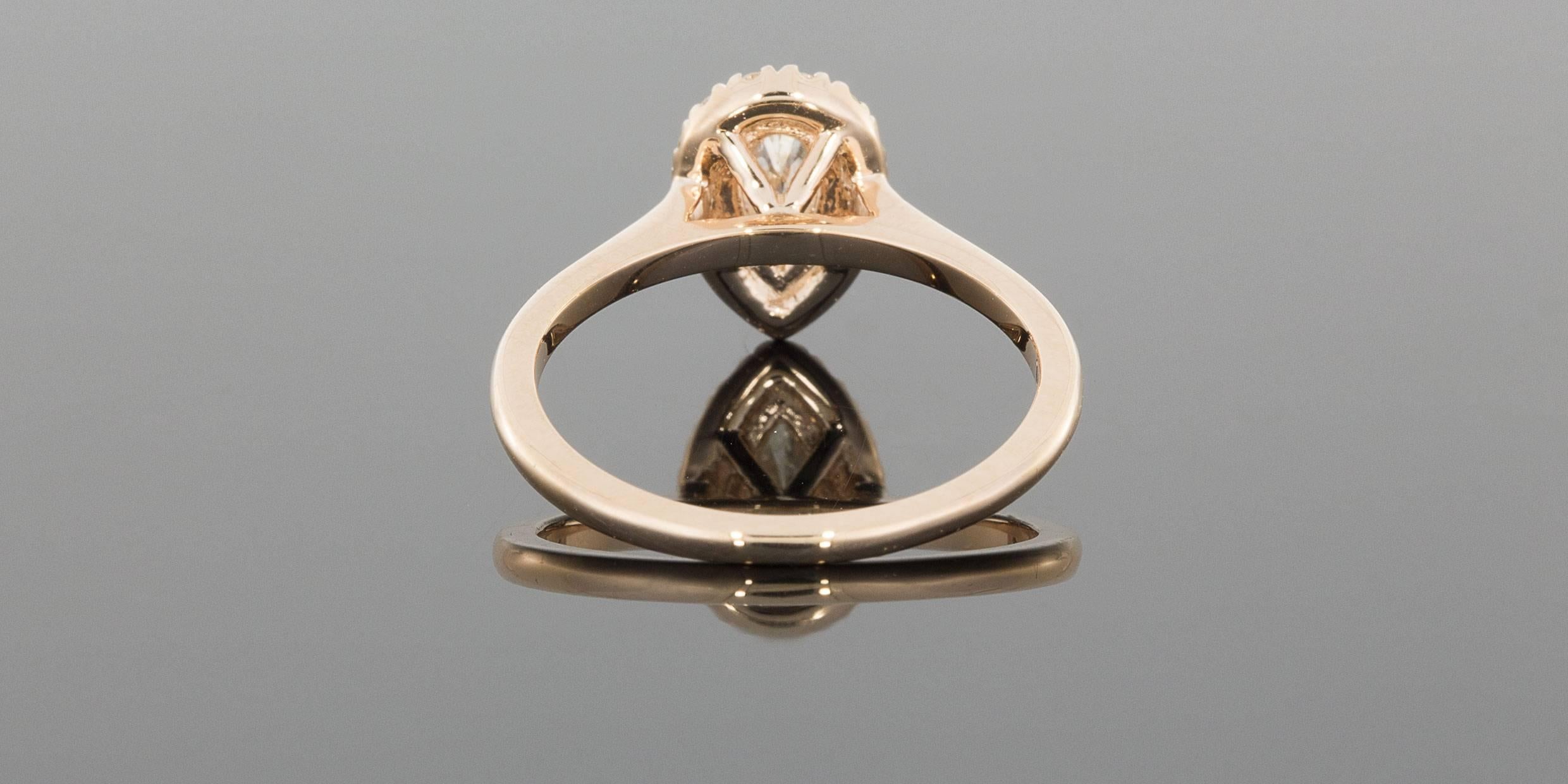 Beautiful Custom Rose Gold Pear Diamond Halo Engagement Ring In New Condition In Columbia, MO