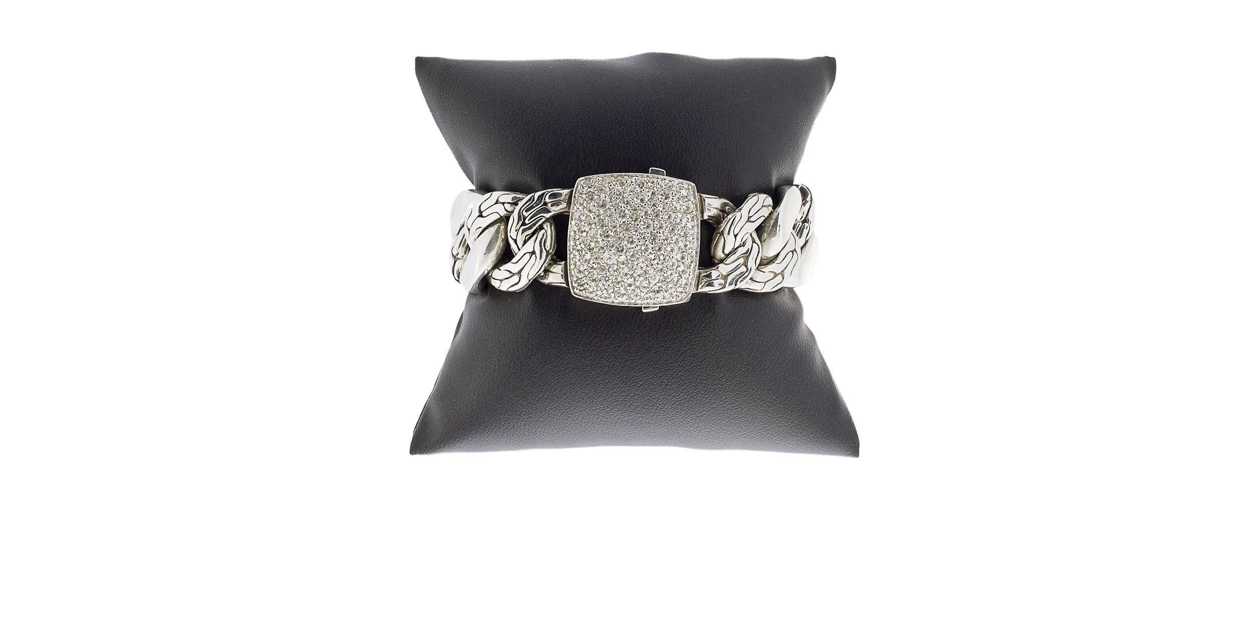 Each piece of John Hardy jewelry has been hand crafted in Bali since 1975. John Hardy is dedicated to creating timeless one-of-a-kind pieces that are brilliantly alive. This beautiful John Hardy bracelet features a pave set cubic zirconia (CZ) clasp