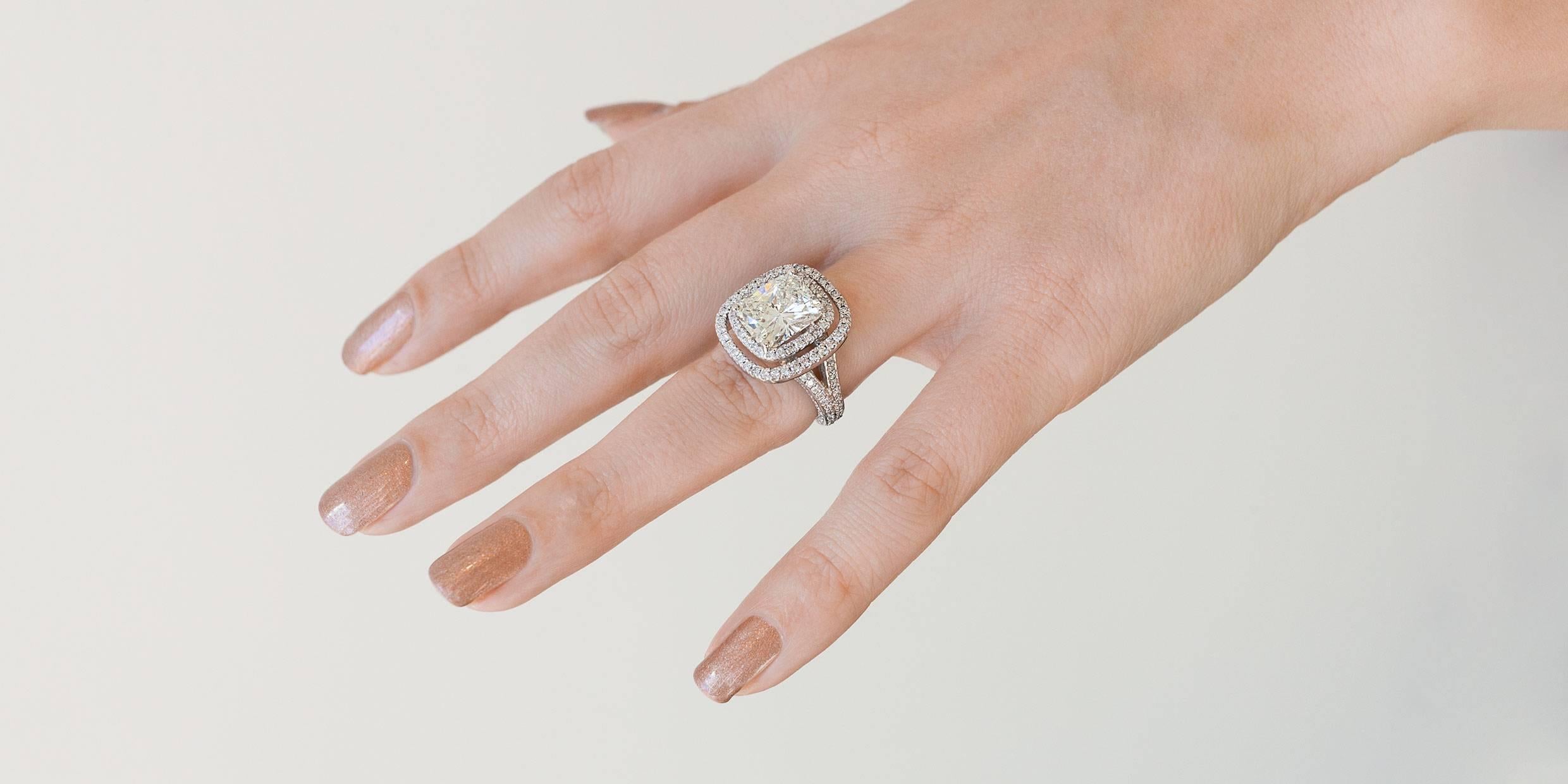 Spectacular Platinum 6.41 Carats Cushion Diamond GIA Cert Halo Engagement Ring For Sale 3