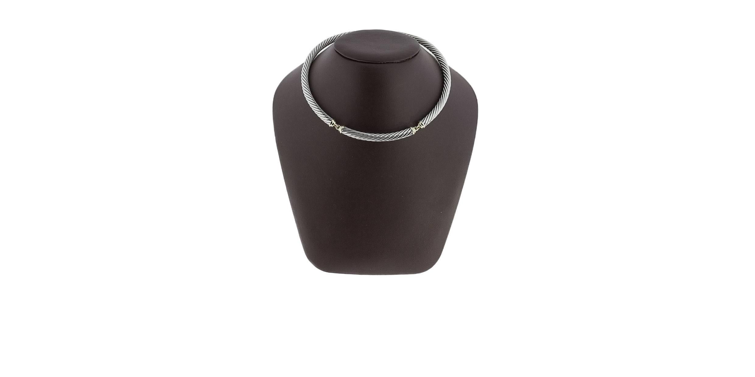 David Yurman's cable style jewelry has become his signature, the unifying element of every collection. This classic necklace features Yurman's iconic cable design in 3 sections of sterling silver cable. These sections are linked together & accented