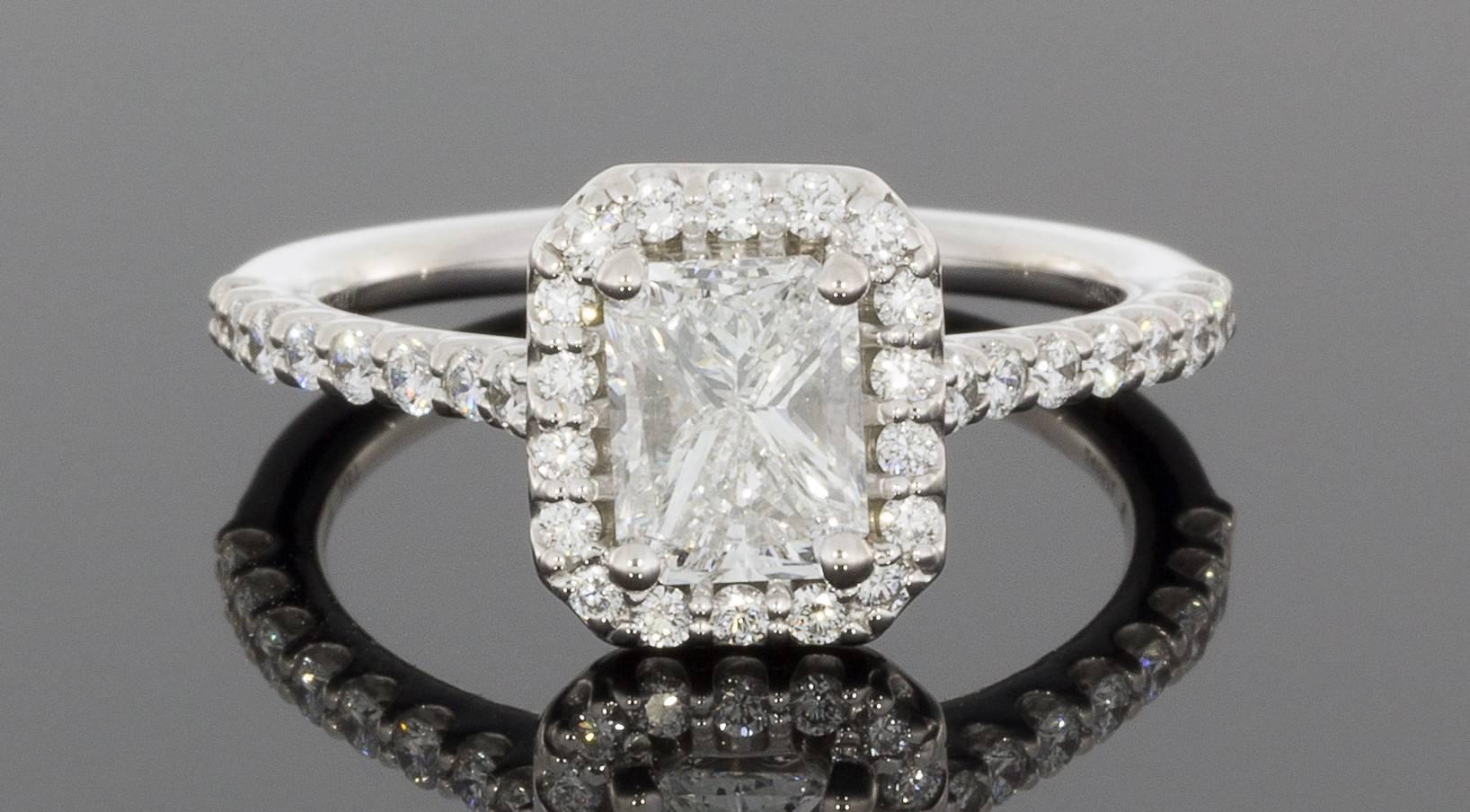 This beautiful halo diamond engagement ring is from the designer Ritani, one of the most recognized designers in the world. Ritani engagement rings feature the world's most beautiful diamonds and gemstones, hand selected by in-house, certified