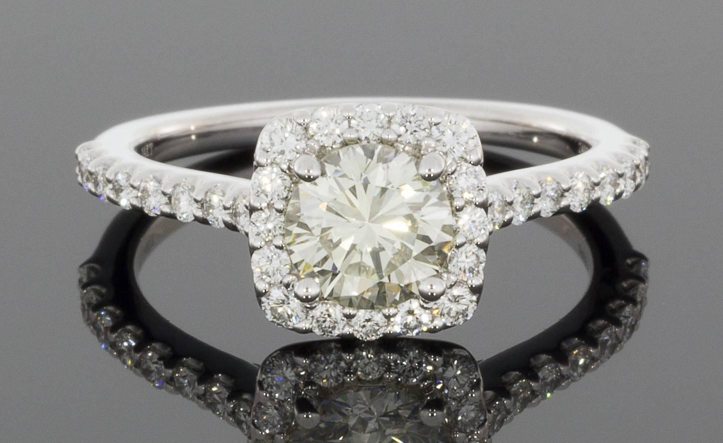 This beautiful halo diamond engagement ring is from the designer Ritani, one of the most recognized designers in the world. Ritani engagement rings feature the world's most beautiful diamonds and gemstones, hand selected by in-house, certified