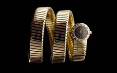 Bulgari Ladies Yellow Gold Tubogas Serpentine Black Dial Quartz Wristwatch
