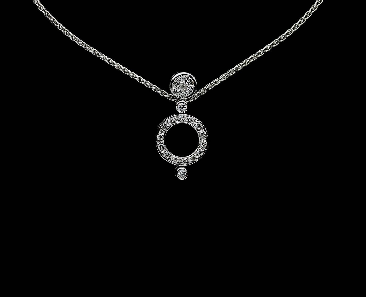 Simple yet elegant & beautiful would be the best way to describe this Antonini necklace. It features sparkly round brilliant diamonds with a combined total weight of .28 carat that grade as G/SI in quality. These diamonds are pave set in an 18