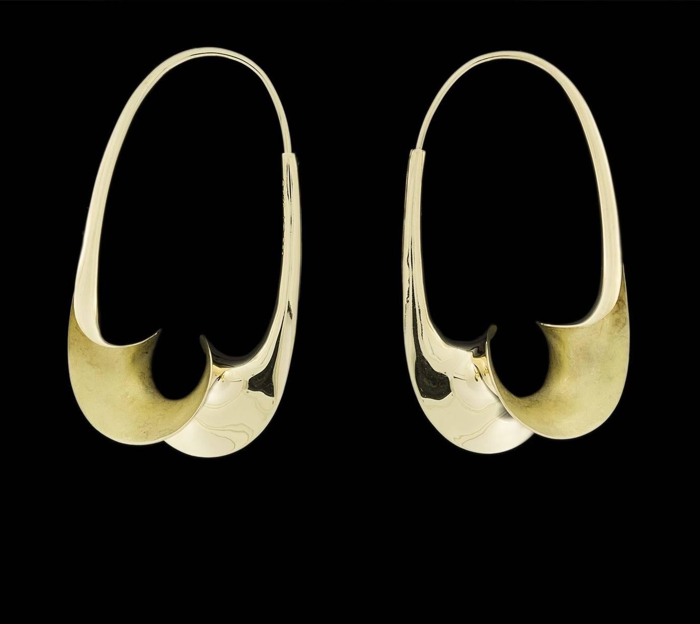 These timeless, versatile Michael Good earrings are handcrafted using the anticlastic raising technique, originally pioneered & developed by Michael himself. This technique, which takes years to master, transforms a single sheet of metal into a