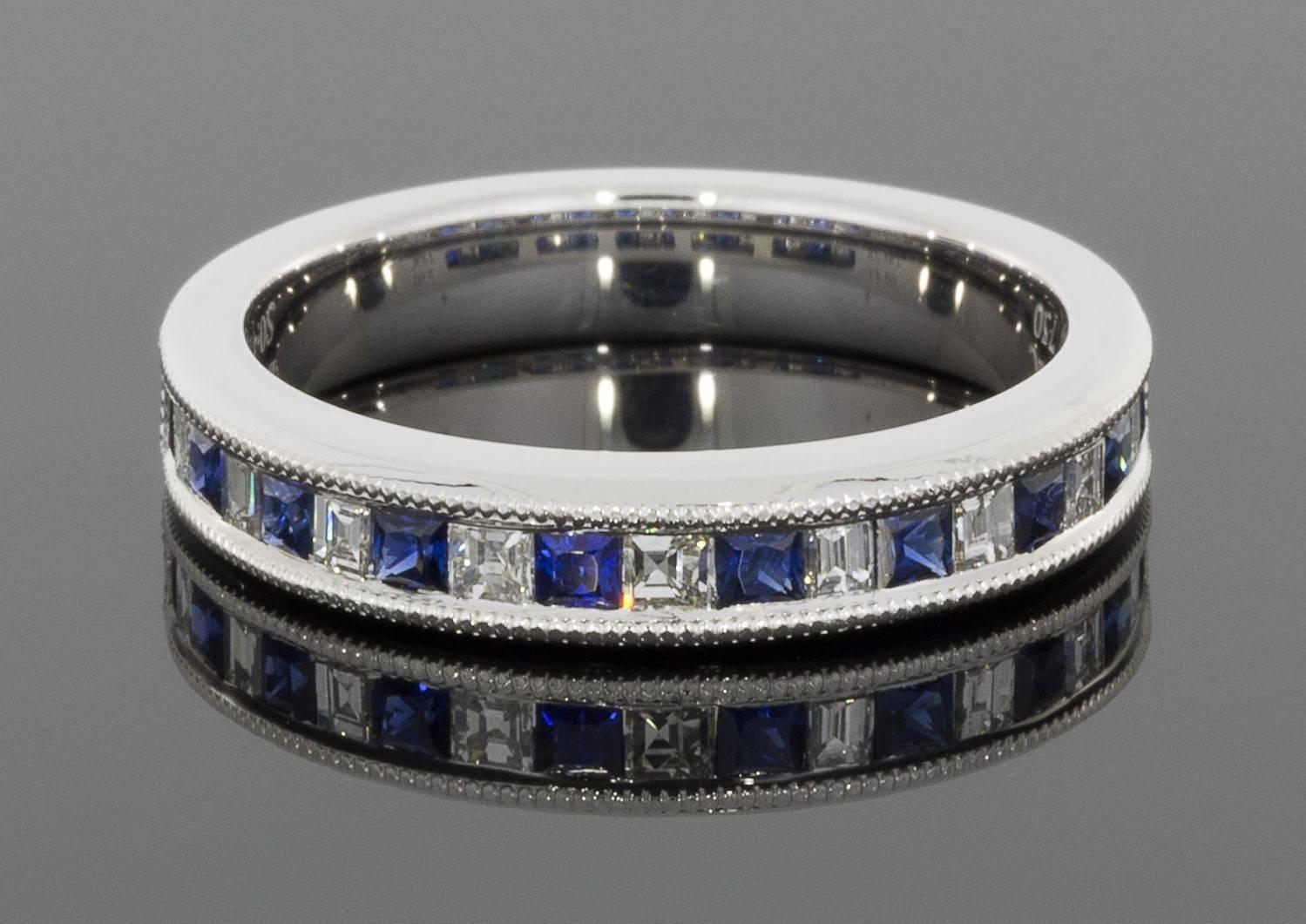 This beautiful & unique band ring features natural, AAA quality, princess cut, blue sapphires & sparkly, G/VS quality, asscher or square baguette cut diamonds. The sapphires have a combined weight of .41 carat & the diamonds have a