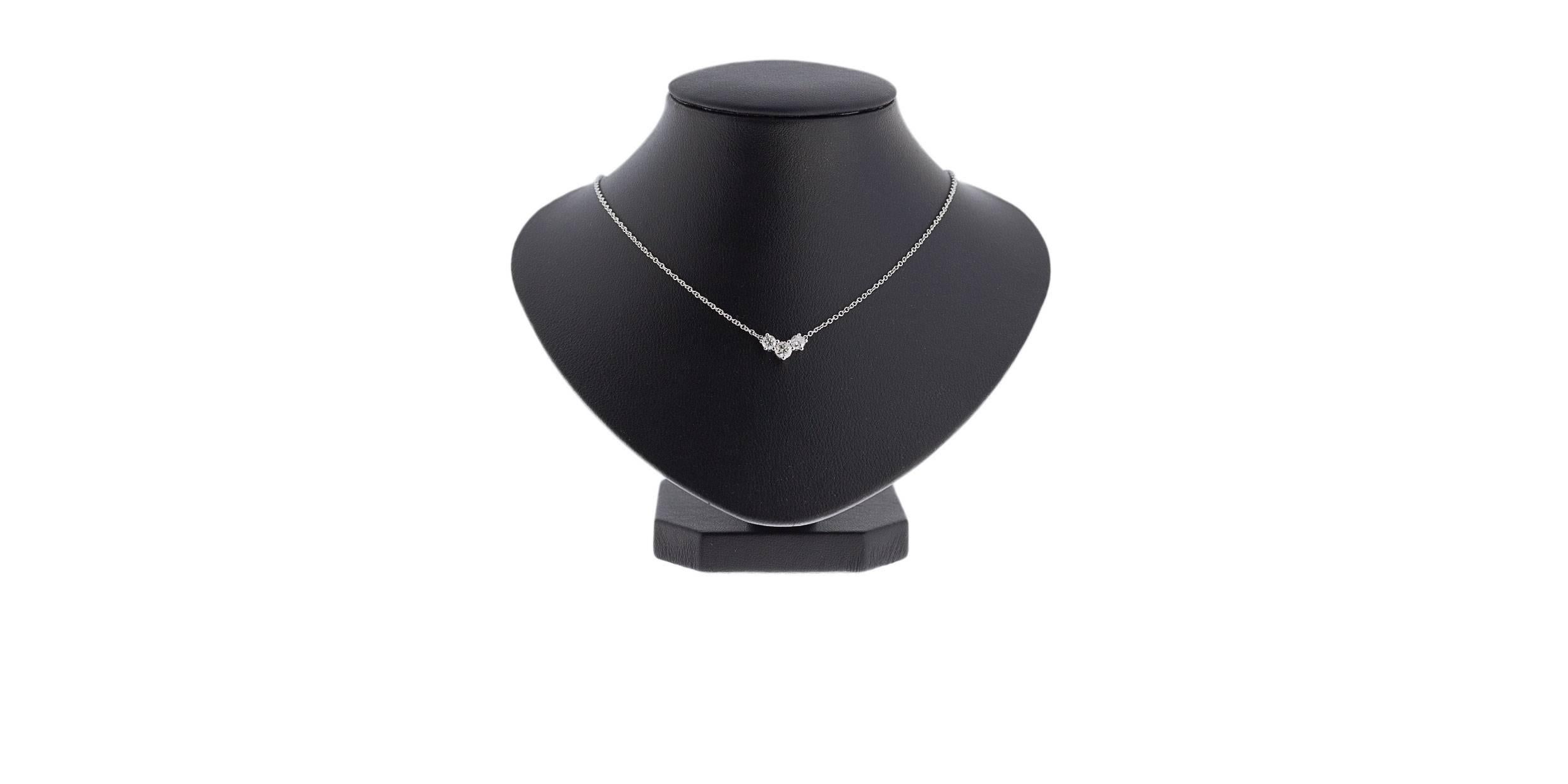 Simple yet elegant & beautiful would be the best way to describe this stunning necklace! It features 3 sparkly, round brilliant cut diamonds with a combined total weight of .50 carat. These diamonds grade as HI/SI2 in quality. They are shared