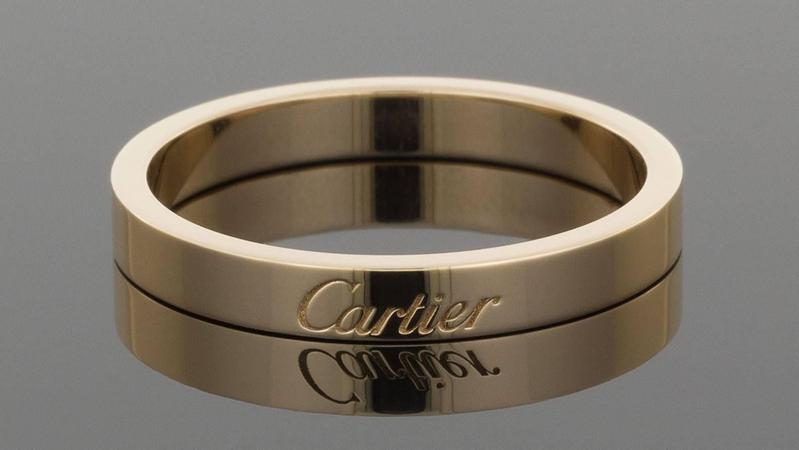 Cartier had its beginning in Paris in 1847 & has grown into a name that is instantly recognizable the world over. This beautiful Cartier wedding band is comprised of 18 karat pink gold & measures approximately 3 millimeters in width. The ring