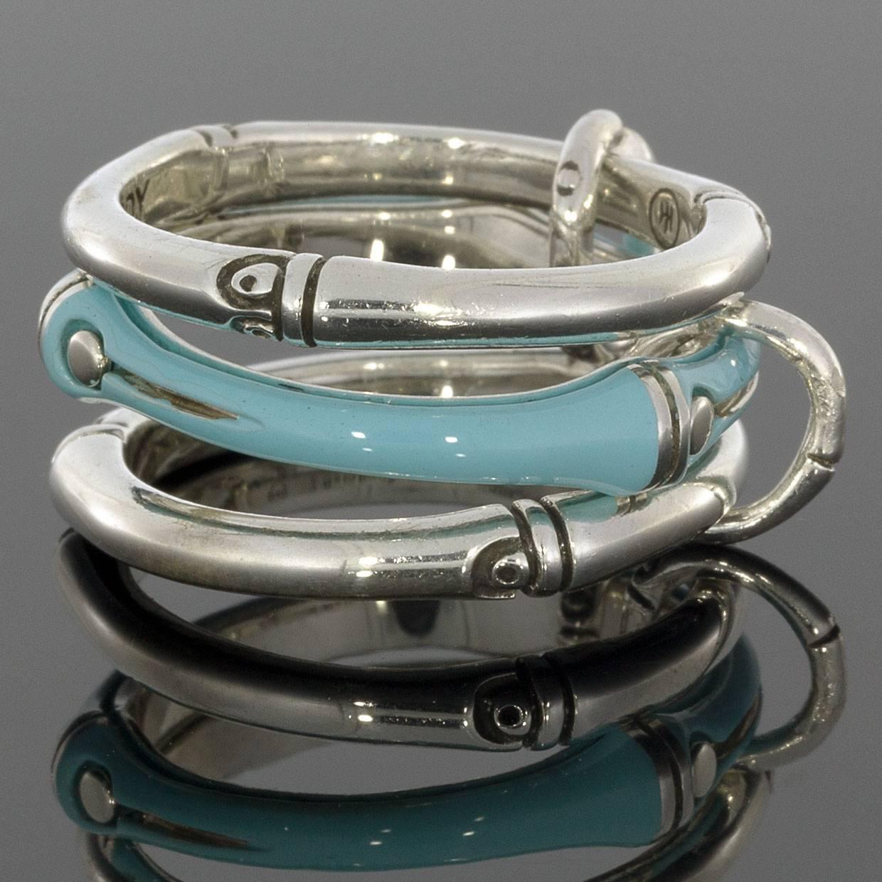 
Each piece of John Hardy jewelry has been crafted in Bali since 1975. John Hardy is dedicated to creating timeless one-of-a-kind pieces that are brilliantly alive.

This stacked sterling silver and enamel ring set is from John Hardy's Bamboo