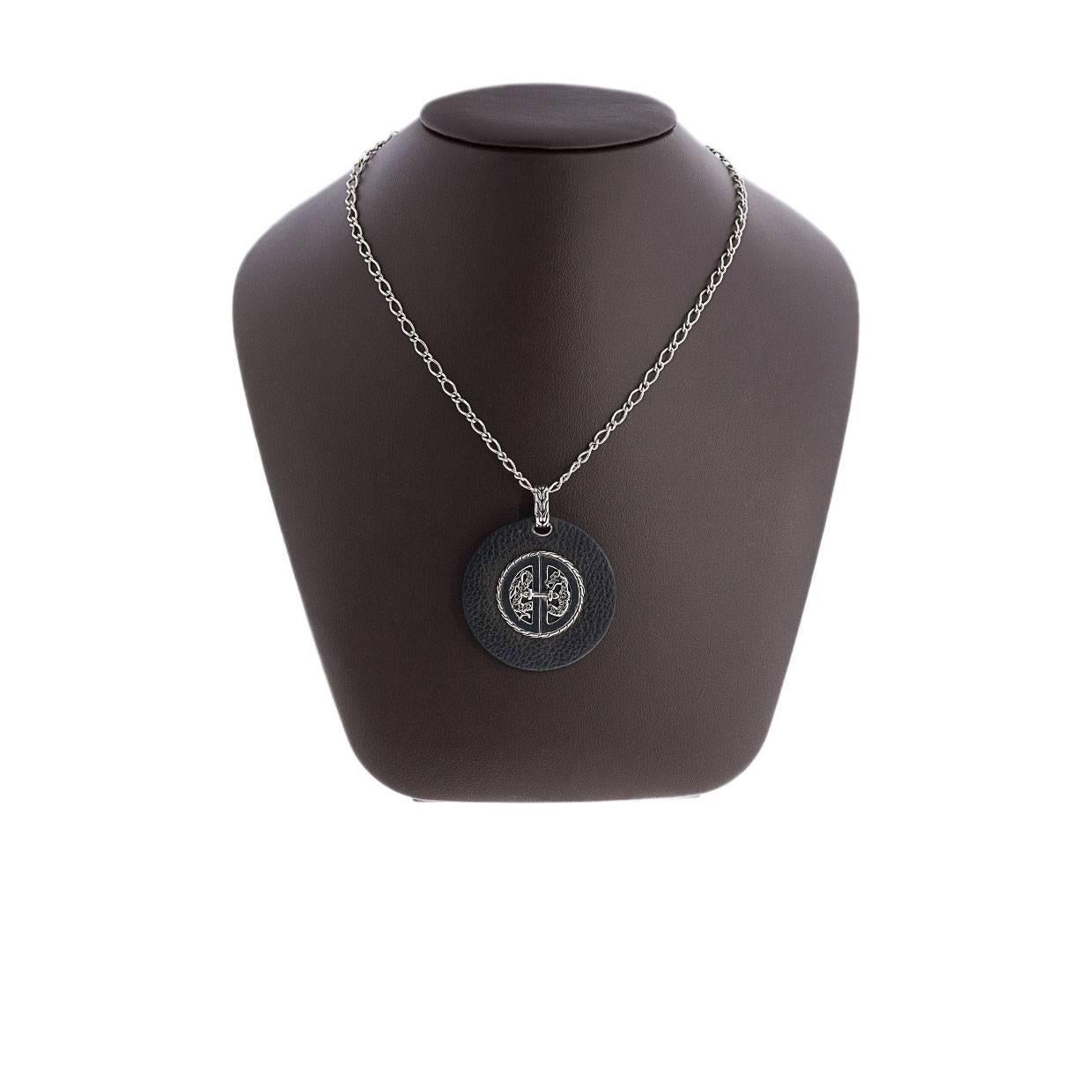 Each piece of John Hardy jewelry has been crafted in Bali since 1975. John Hardy is dedicated to creating timeless one-of-a-kind pieces that are brilliantly alive.
 MSRP $450! 

Details:
John Hardy Naga Dragon Leather and Silver Medallion Pendant