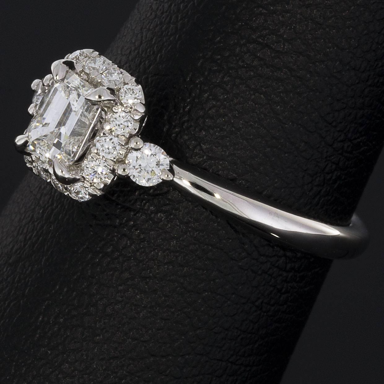 Women's 14 Karat White Gold Emerald Halo Diamond Engagement Ring