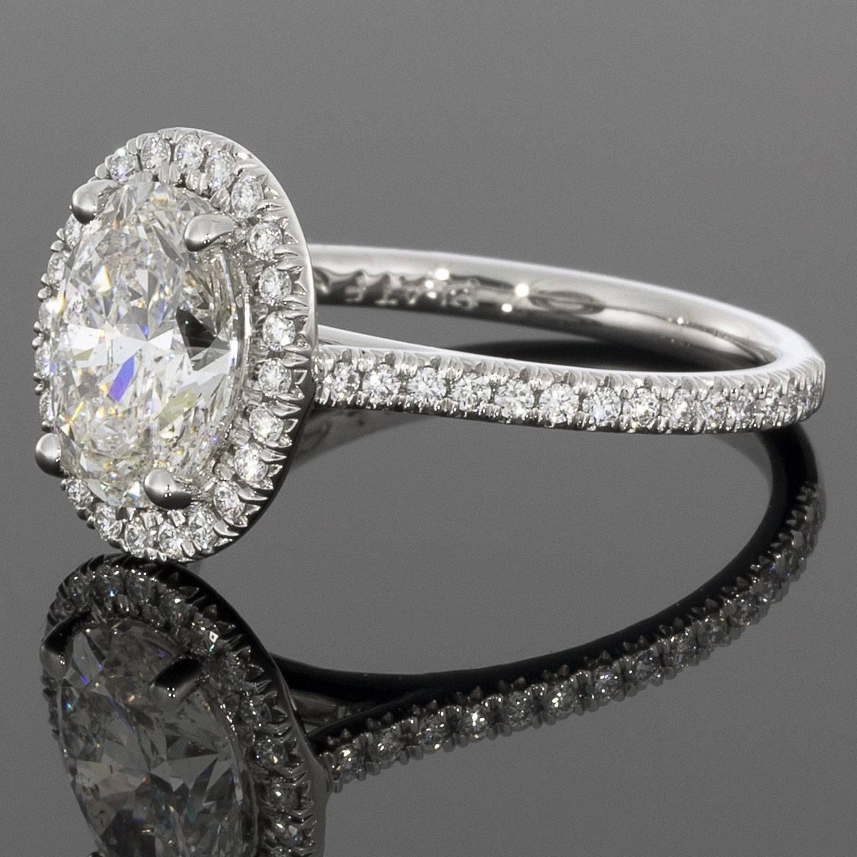 Take her breath away with this spectacular 2.12CTW diamond ring from Martin Flyer! This 65 year old, third generation family-owned business handcrafts all their rings with extraordinary attention to detail, using only the highest quality, Hearts &