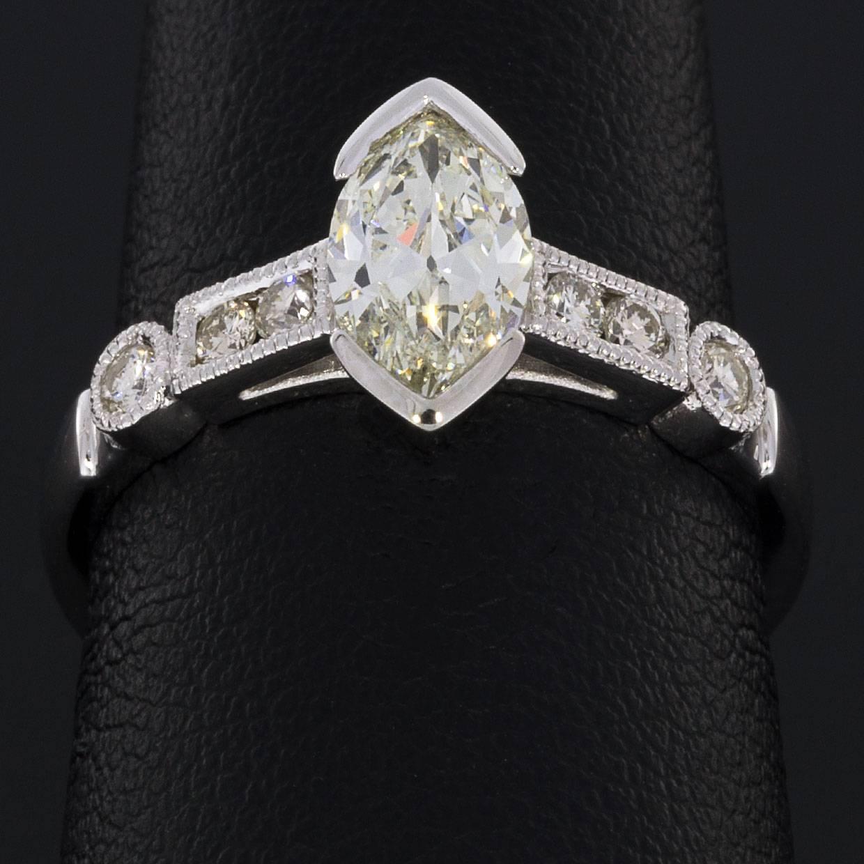 Marquise Cut .96 Carat Marquise and Round Diamond Engagement Ring