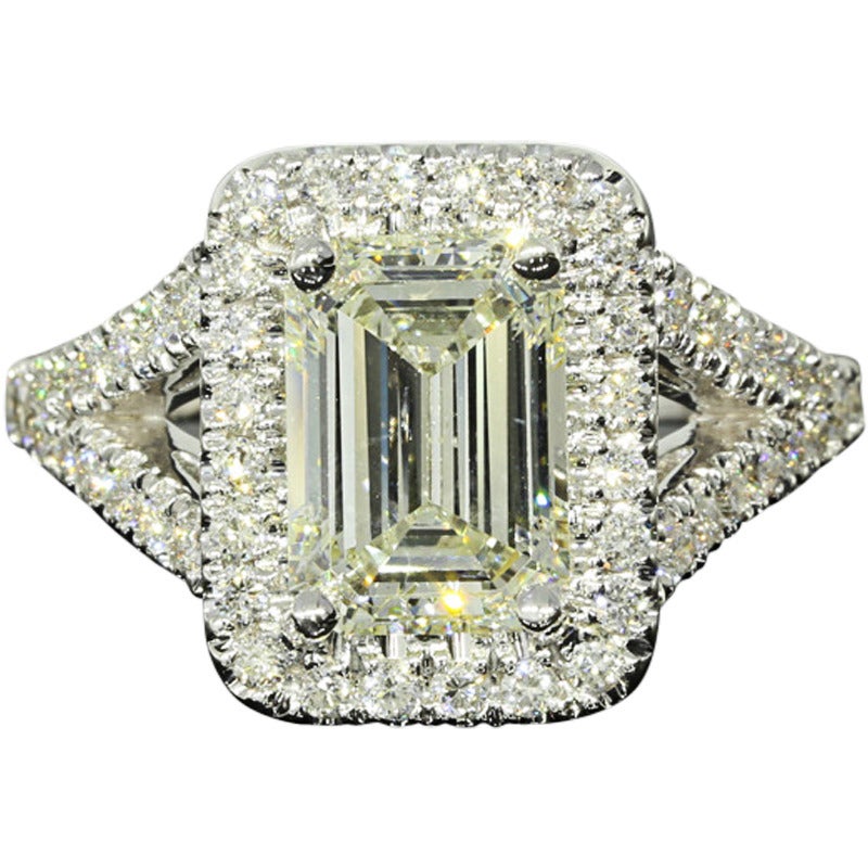 2.01 Carat Emerald Cut Diamond Gold Halo Ring