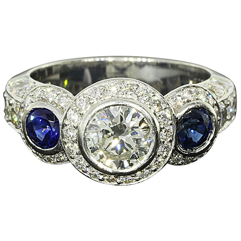 Platinum Diamond and Blue Sapphire Bezel Set Ring