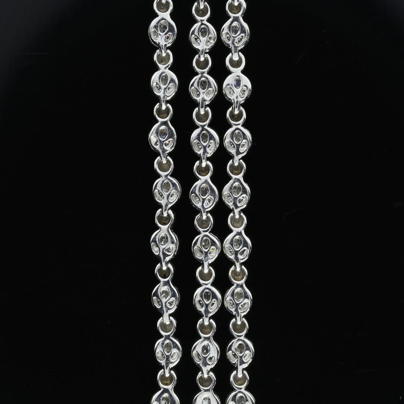 This bracelet is from the designer Roberto Coin. The three strand bracelet features round brilliant cut diamonds weighing 3.65CTW. The diamonds are G/SI1 in quality. The diamonds are bezel set in a three strand style bracelet that measures 7.75