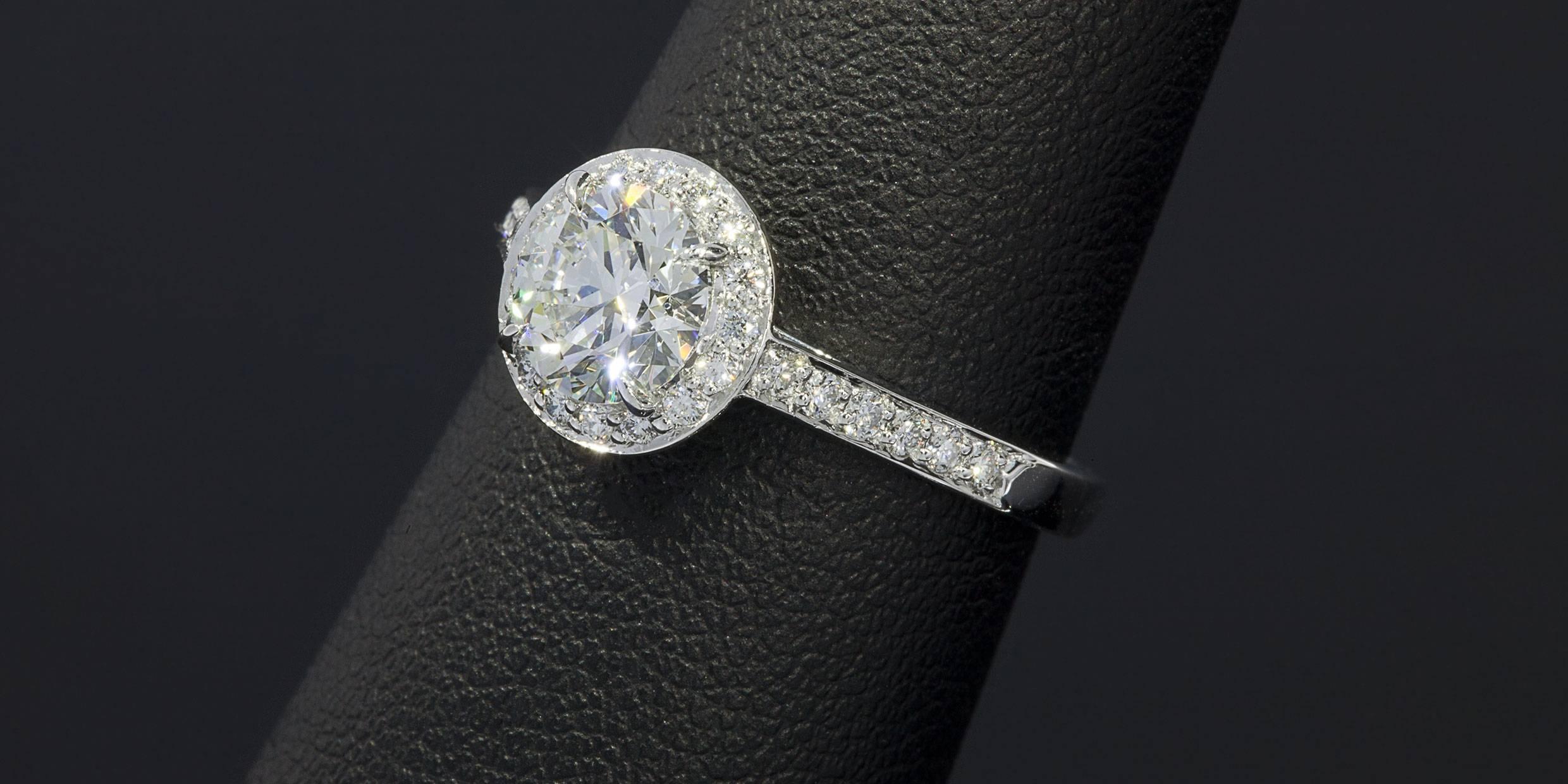 Tiffany & Co. 1.06 Carat Diamond Platinum Embrace Halo Engagement Ring In Excellent Condition In Columbia, MO