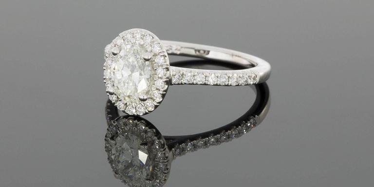 martin flyer 75 carat oval diamond micropave halo gold engagement flyer ring