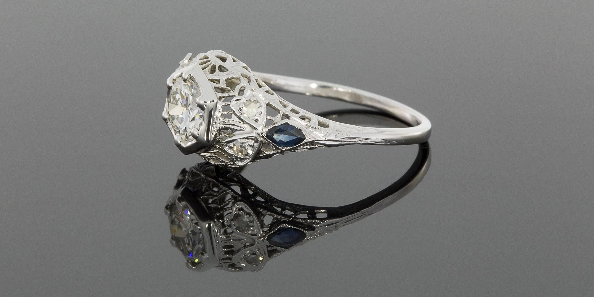 This beautiful, vintage diamond ring features a 3/4 carat circular brilliant cut center diamond that is an I/I1 in quality. This diamond is 6-prong set in a hexagon shaped top. Lovely, unique details can be found all over this treasure such as