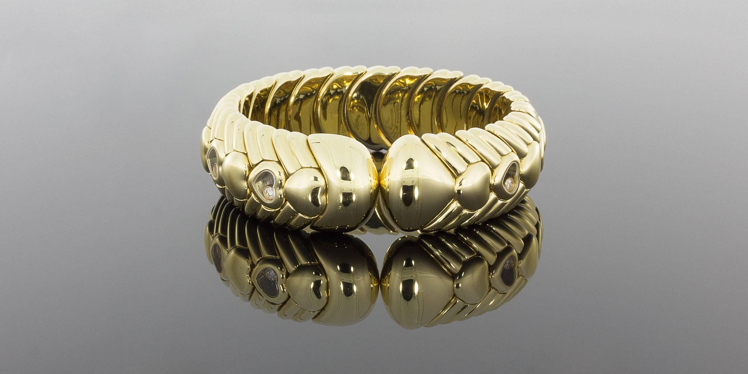 Women's Rare Chopard 18 Karat Yellow Gold Happy Diamonds Heart Flex Bangle Bracelet For Sale