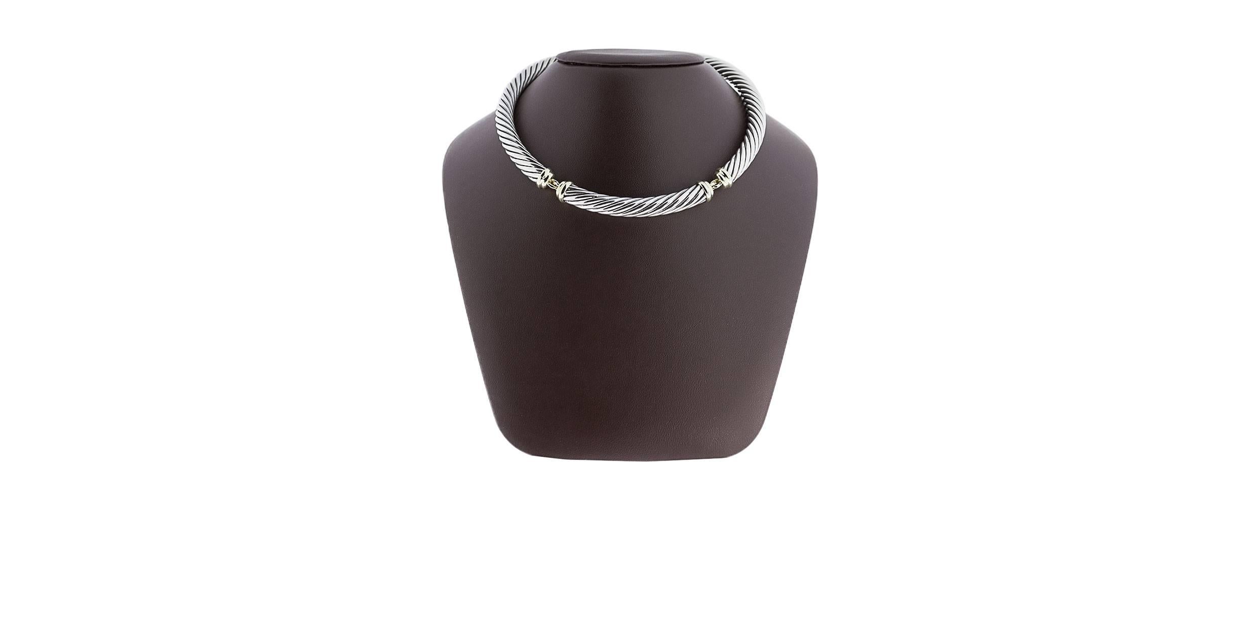 David Yurman's cable style jewelry has become his signature, the unifying element of every collection. This classic necklace features Yurman's iconic cable design in 3 sections of sterling silver cable. These sections are linked together & accented