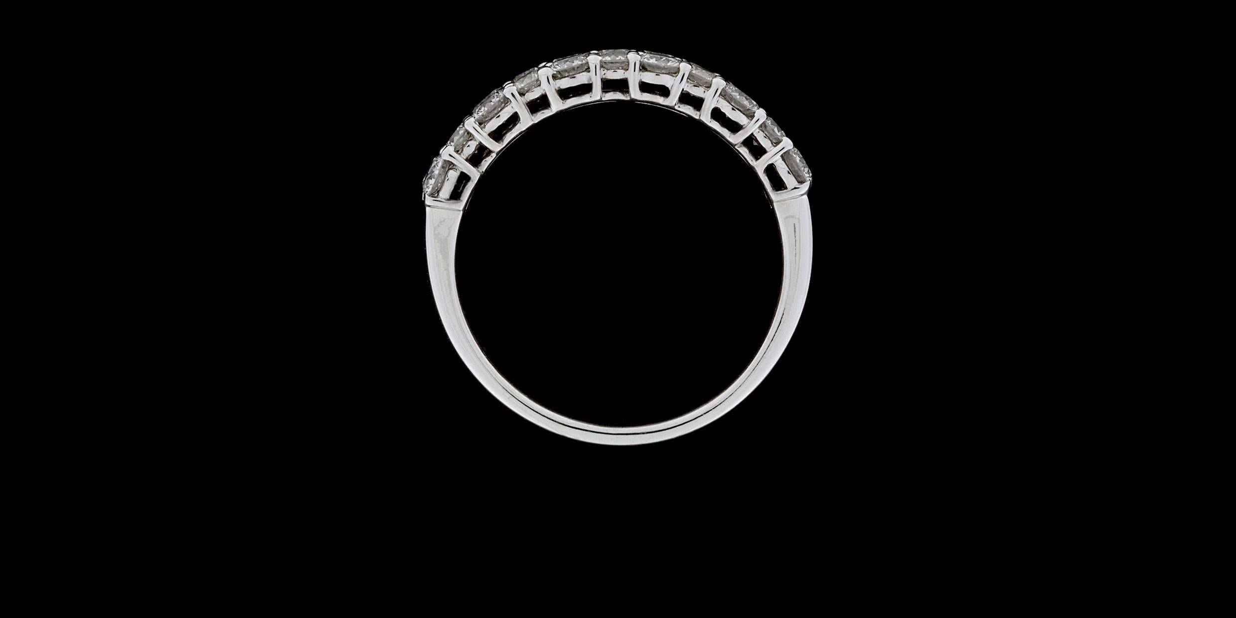 Women's 18 Karat White Gold Round Diamond Shared Prong 3-Row Wedding Band Ring