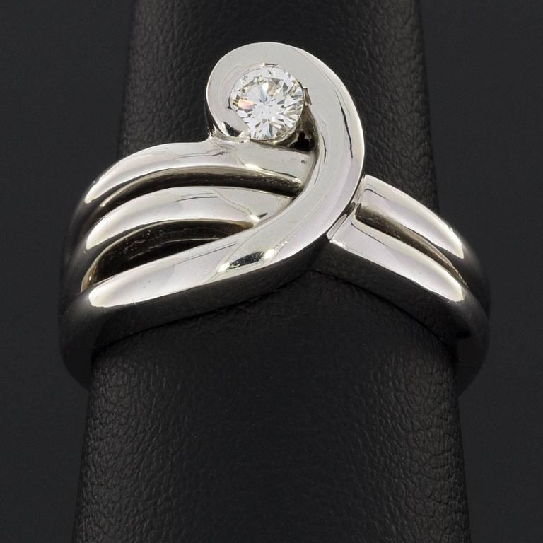 White Gold Round Diamond Wide Solitaire Swirl Ring For Sale at 1stDibs
