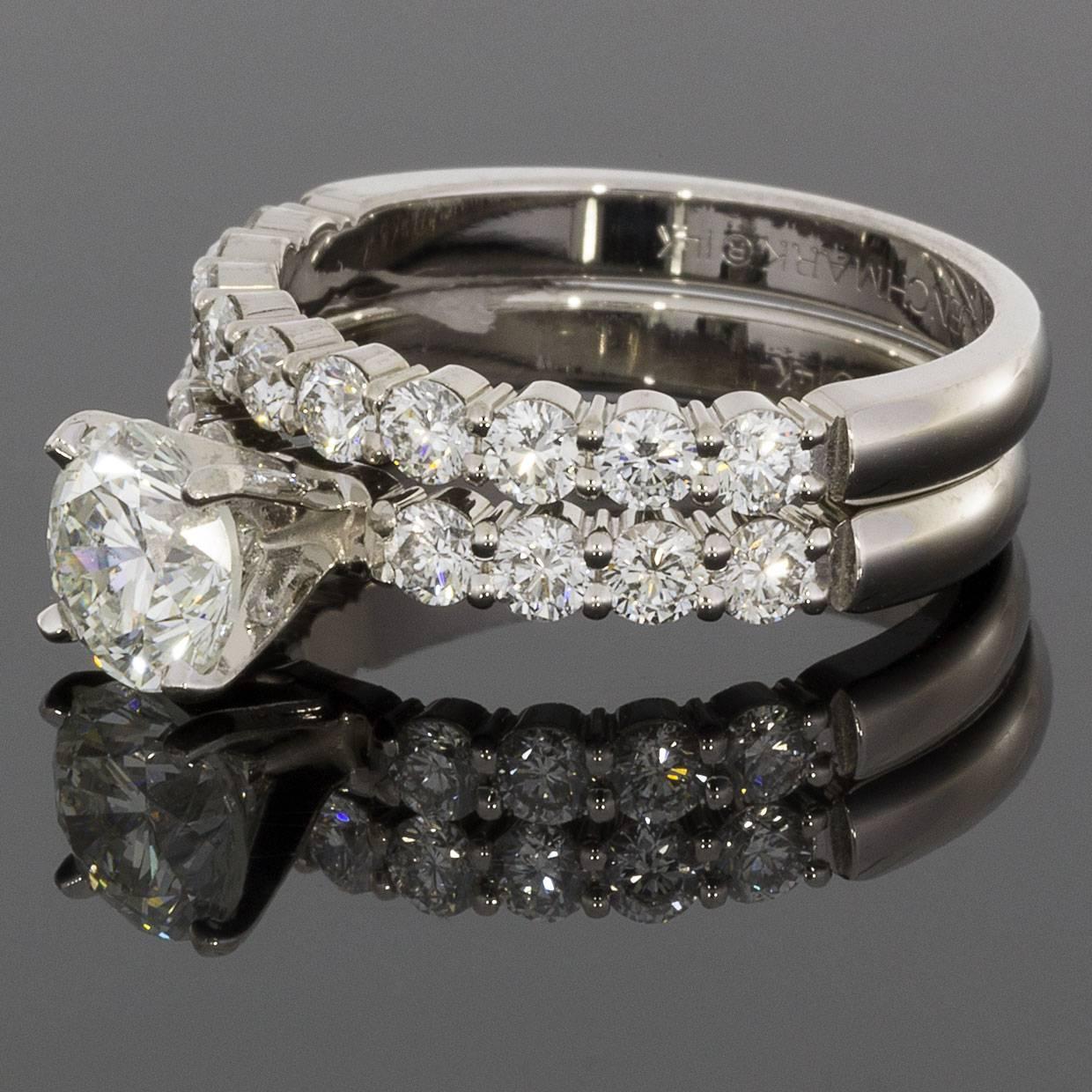 This gorgeous engagement ring & wedding band set is from the designer Benchmark. Founded over 40 years ago, Benchmark is an All-American enterprise that has become a leader in the production of designer jewelry. All Benchmark rings are die