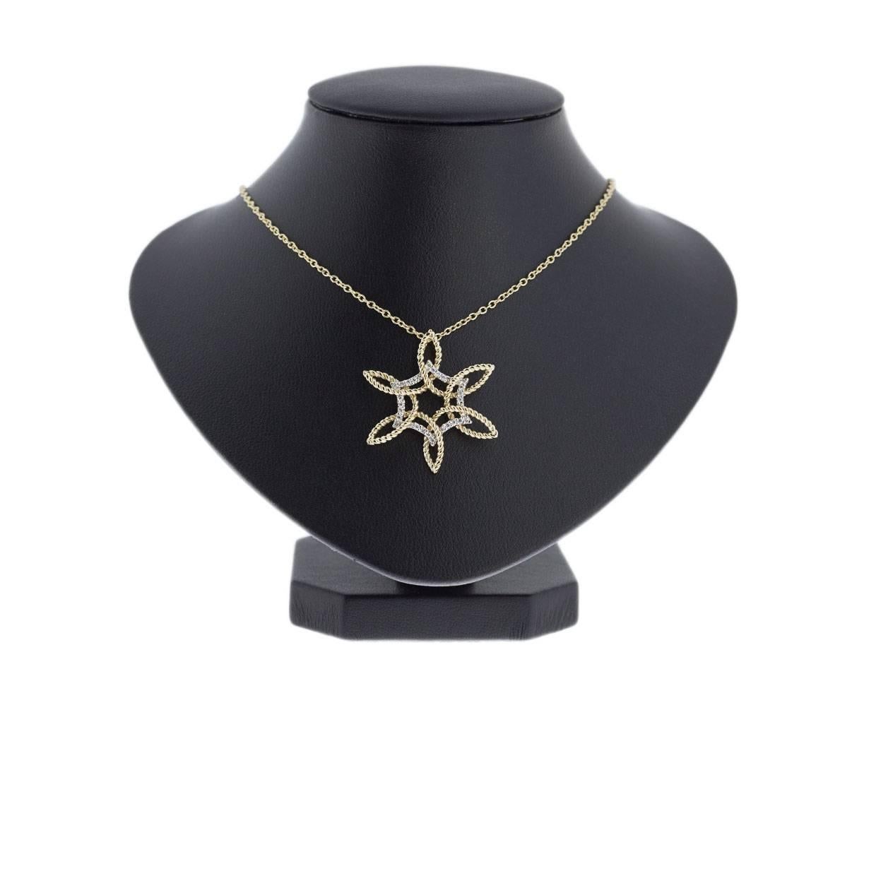 Simple yet elegant & beautiful would be the best way to describe this stunning necklace! It features sparkly, round brilliant cut diamonds that are pave set in a white gold, curved edge hexagon shape. Luscious, rope design yellow gold loops