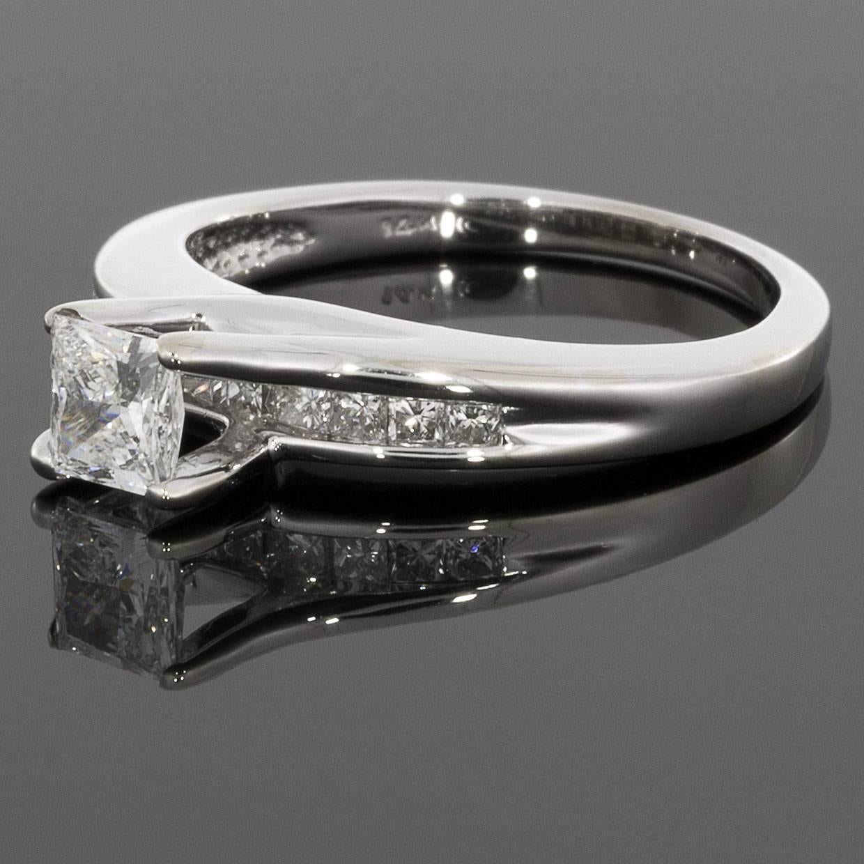This beautiful diamond engagement ring features sparkly, brilliant princess cut diamonds. These diamonds have a combined total weight of .50 carat & grade as IJ/SI in quality. The center diamond weighs approximately .37 carat. The 14 karat,