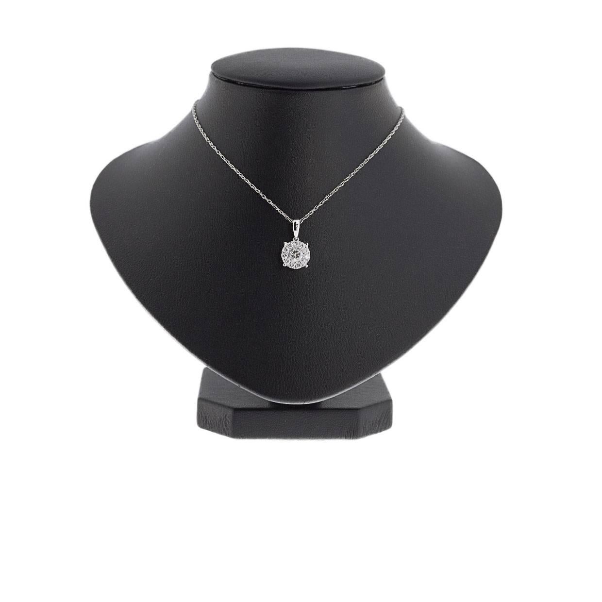 Simple yet elegant & beautiful would be the best way to describe this stunning necklace! This timeless pendant gives a really big look, featuring sparkly round brilliant cut diamonds in a lovely halo pendant. The diamonds have a combined total